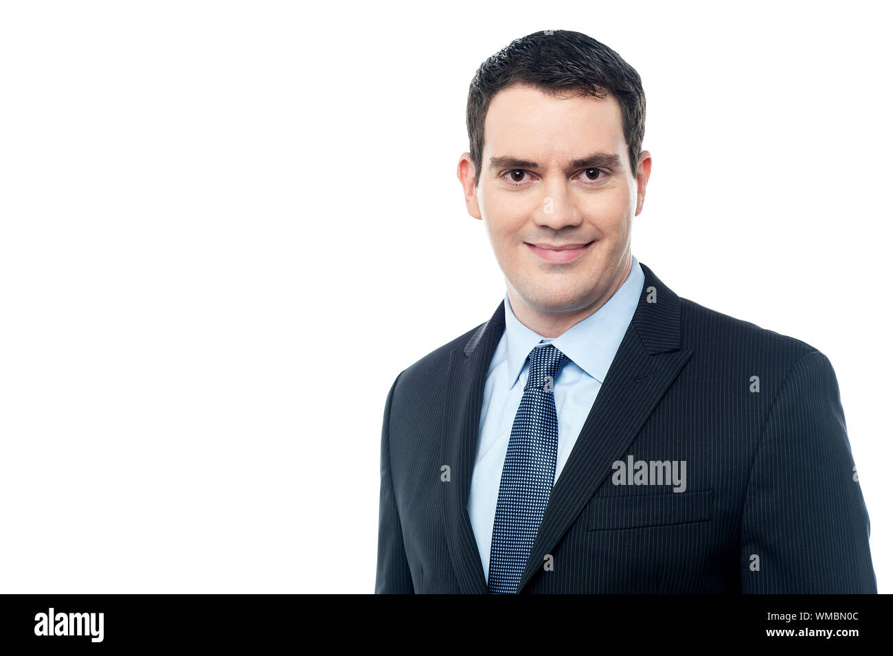 Confident businessman posing over white Stock Photo - Alamy