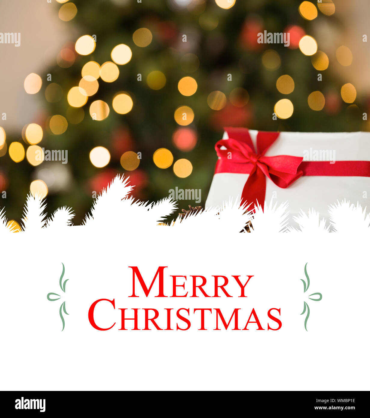 Christmas greeting card against focus on christmas gift and pine cone Stock Photo - Alamy