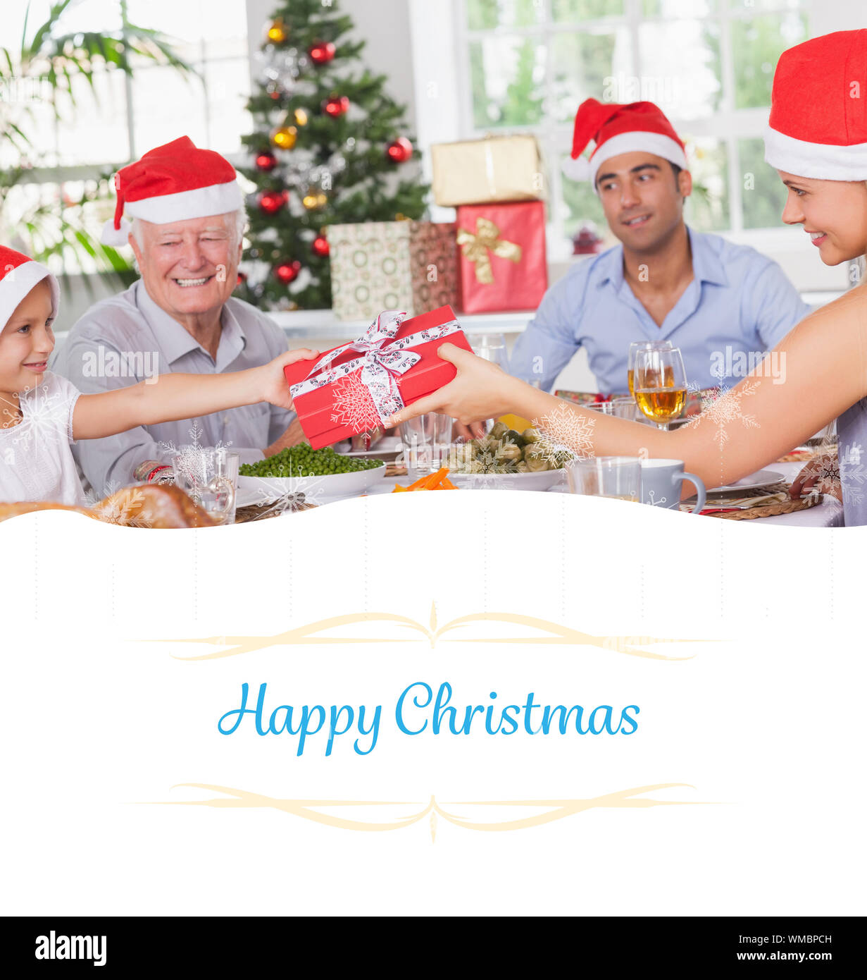 Composite image of mother giving daughter christmas present  against border Stock Photo