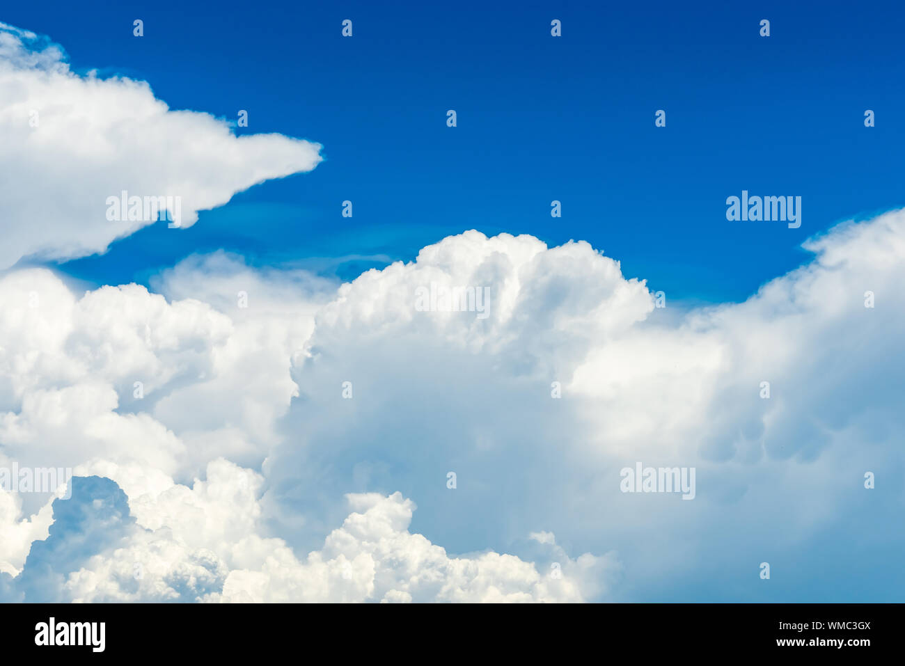 clouds abstract background. Cloudscape background. Blue sky and fluffy white clouds on sunny day. Nature weather. Bright day sky for happy day Stock Photo
