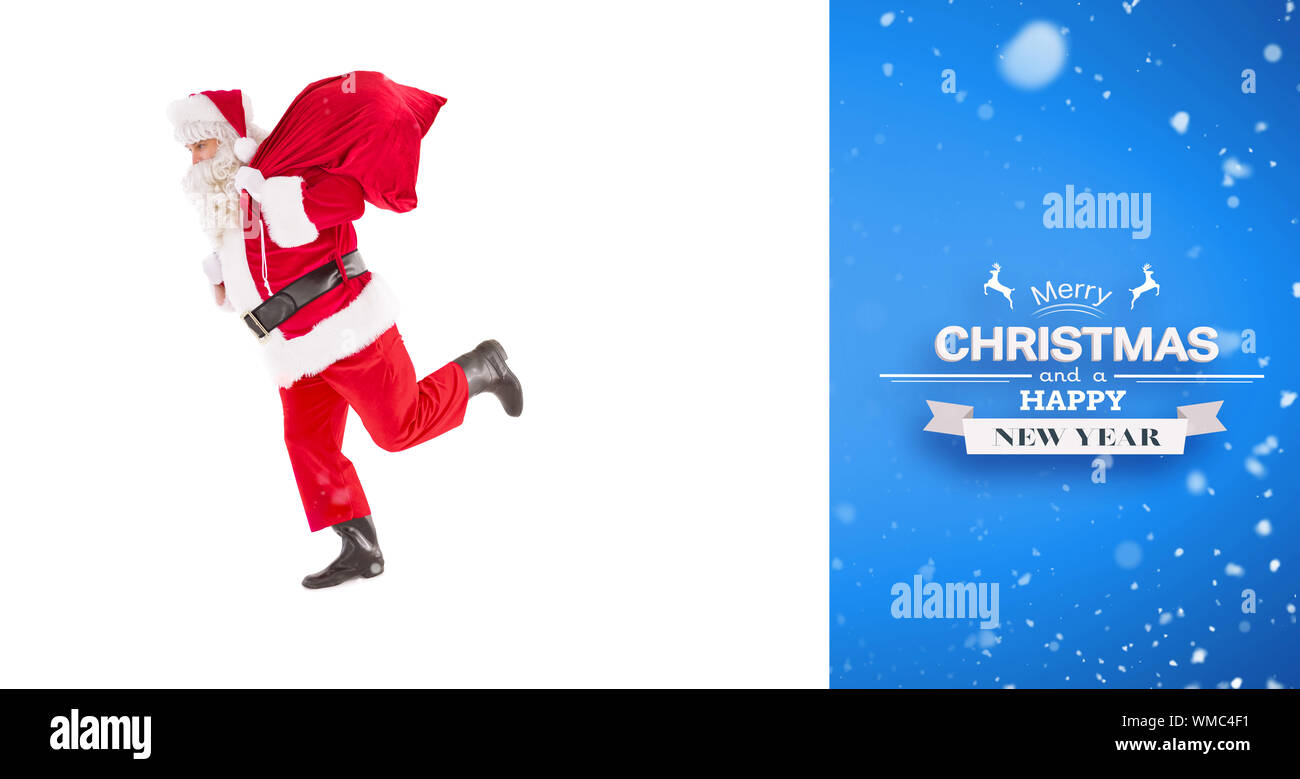 Santa claus walking with a sack against blue vignette Stock Photo - Alamy