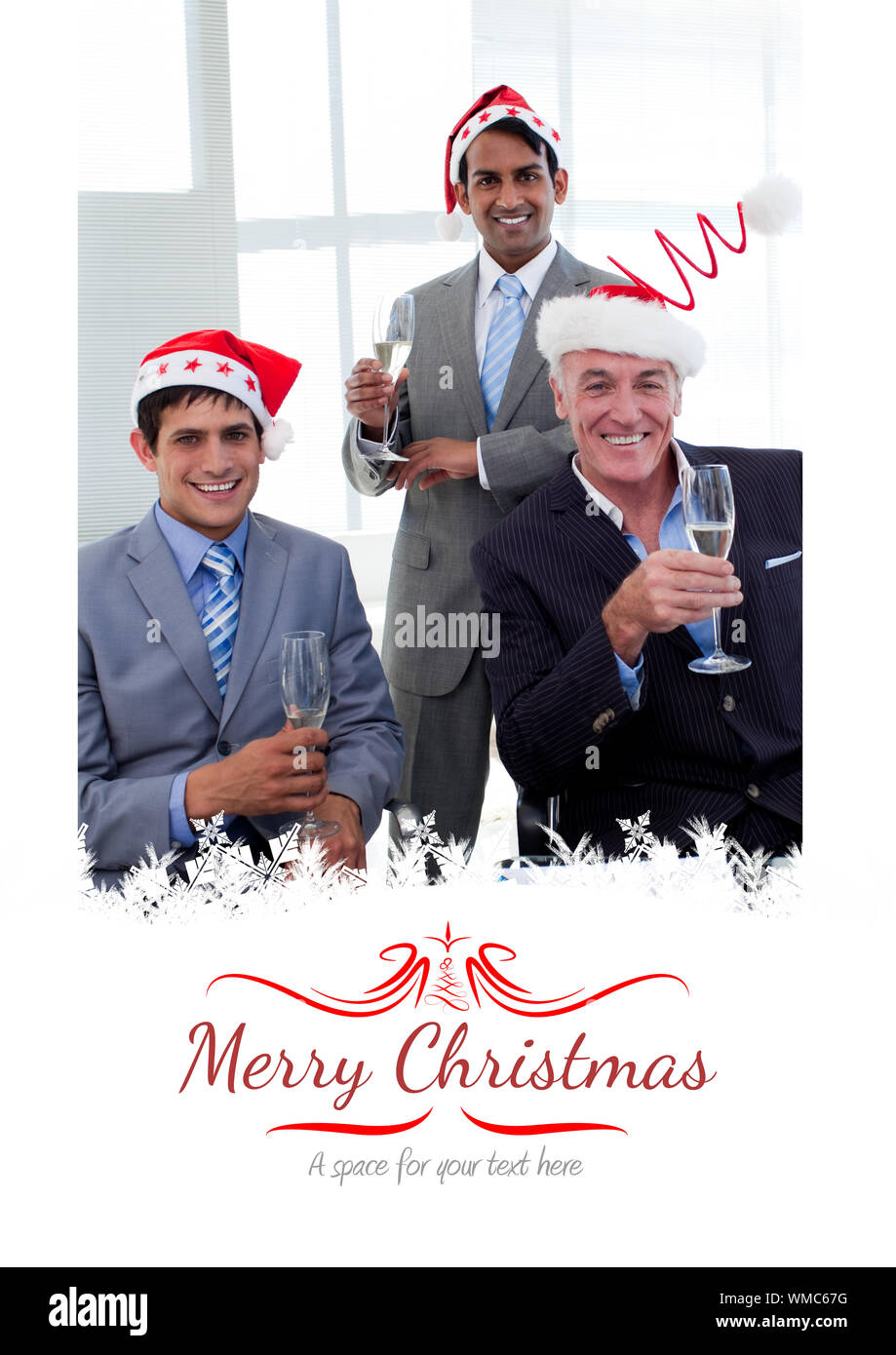 Confident businessmen wearing novelty Christmas hat against border Stock Photo