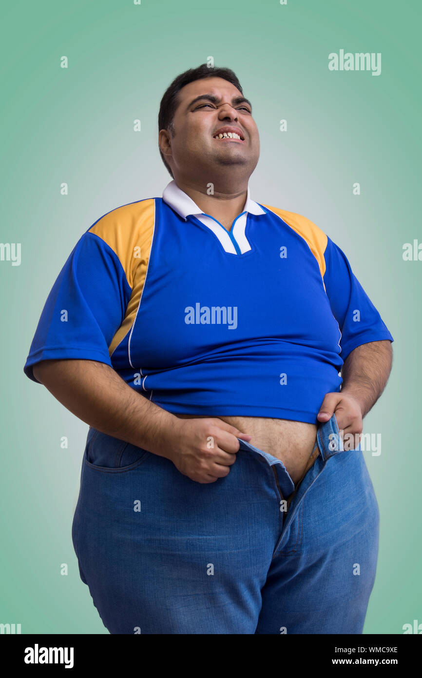 Man pants and stomach hi-res stock photography and images - Alamy