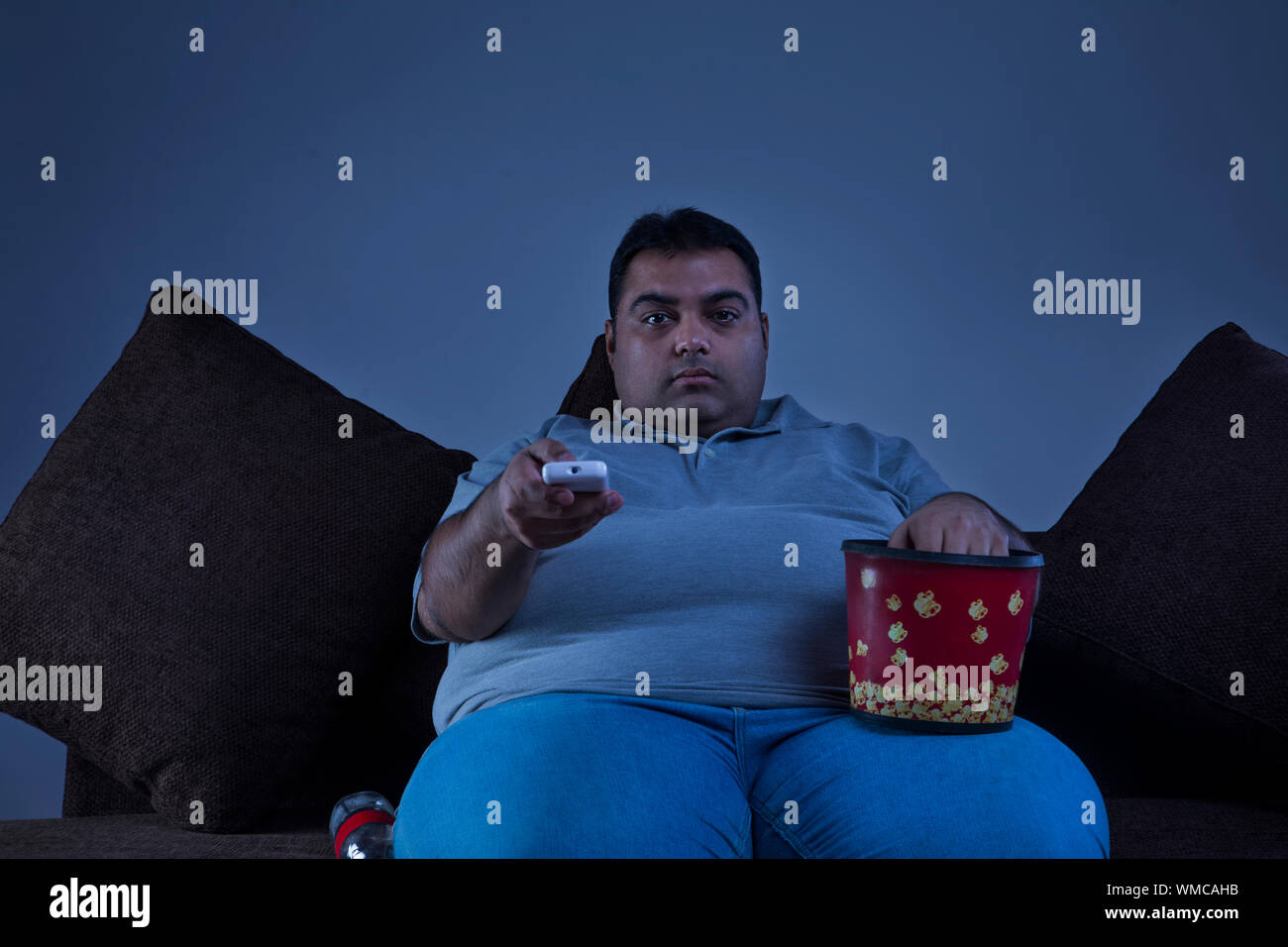 Overweight sofa television side hires stock photography and images Alamy