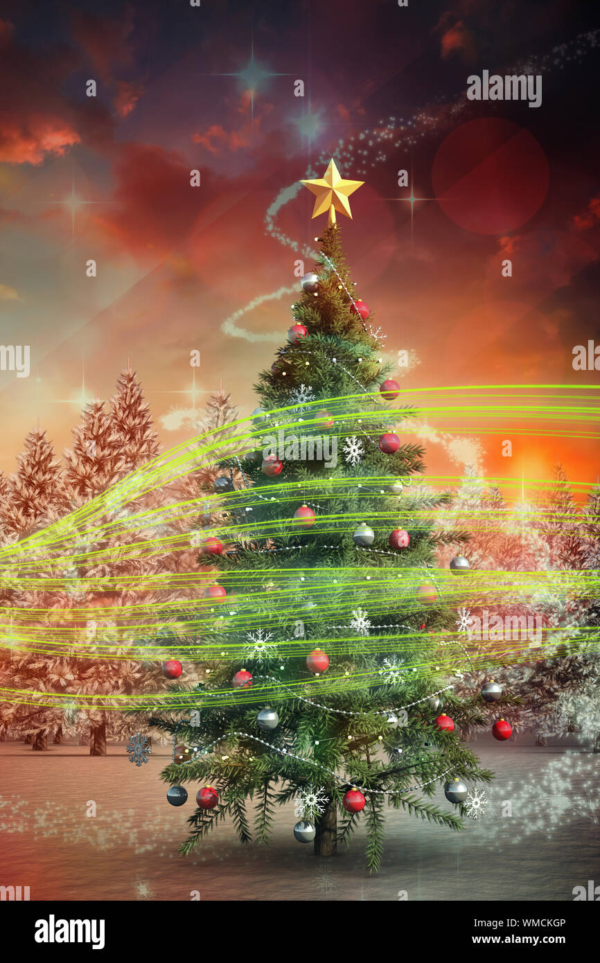 Composite image of christmas tree with falling snow Stock Photo - Alamy