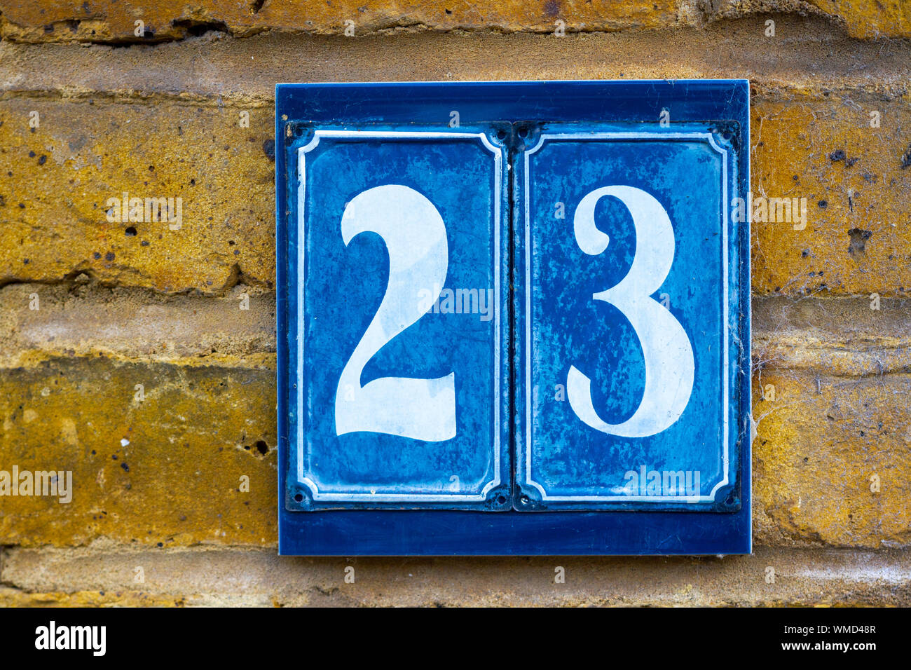 House number 23 in blue tiles Stock Photo