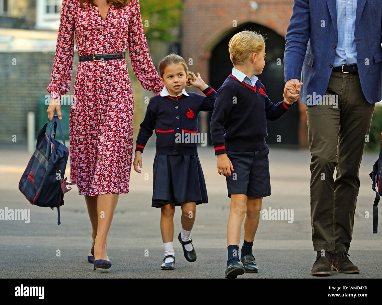 Princess Charlotte arrives for her first day at school, with her brother Prince George and her parents the Duke and Duchess of Cambridge, at Thomas's Battersea in London. Stock Photo