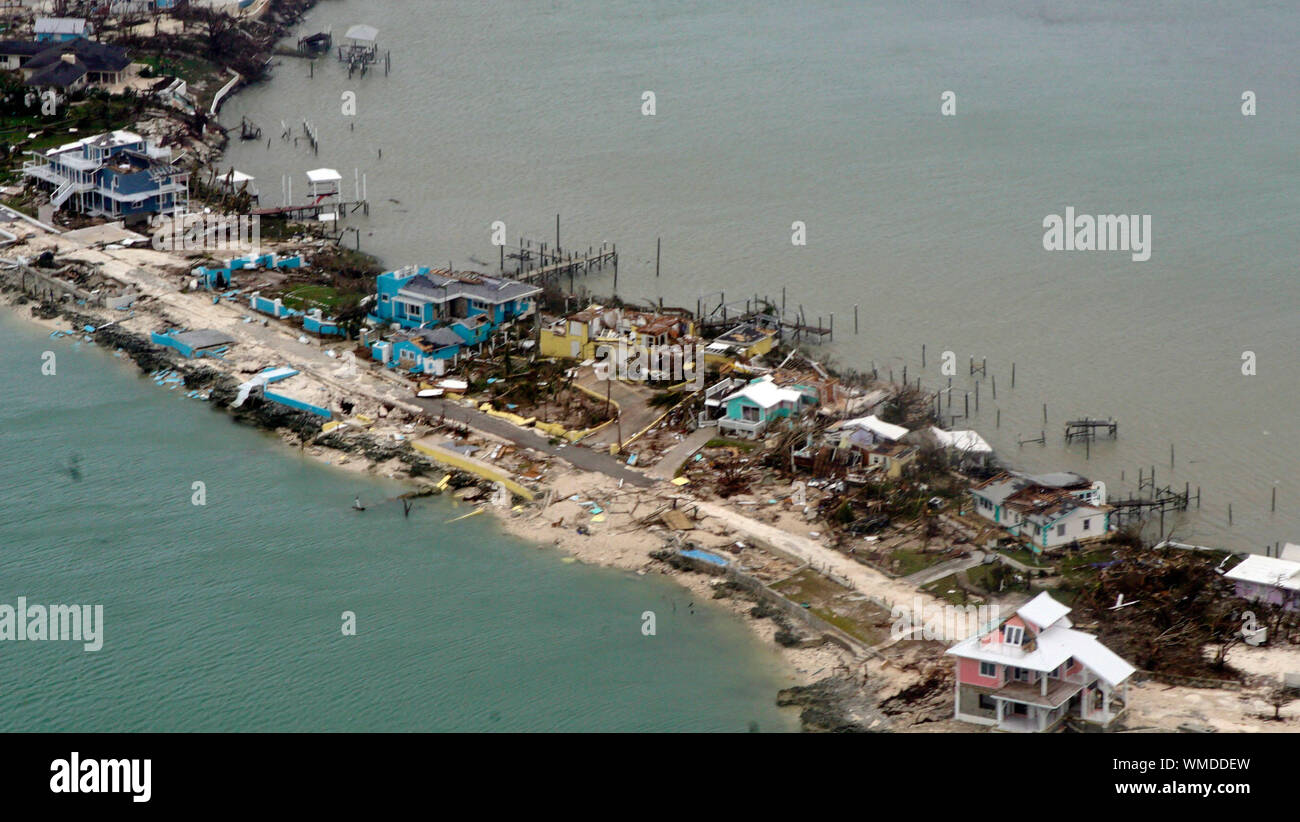 Overhead view of a row of damaged structures in the Bahamas from a Coast Guard Elizabeth City C-130 aircraft after Hurricane Dorian shifts north Sept. 3, 2019. Hurricane Dorian made landfall Saturday and intensified into Sunday. U.S. Coast Guard photo by Petty Officer 2nd Class Adam Stanton. Stock Photo