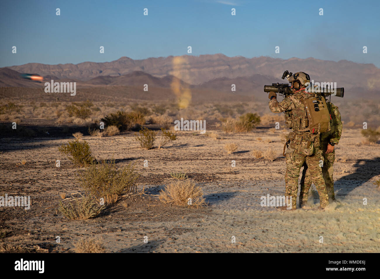 A Green Beret assigned to 3rd Special Forces Group (Airborne) fires an M3 Carl Gustaf Rocket launcher during a training event near Nellis Air Force Base, Nev., Aug. 26, 2019. U.S. Special Forces trained with U.S. Air Force Joint Terminal Attack Controllers and utilized weapons ranging from small arms to A-10 Thunderbolt ll aircraft. (U.S. Army photo by Sgt. Steven Lewis) Stock Photo