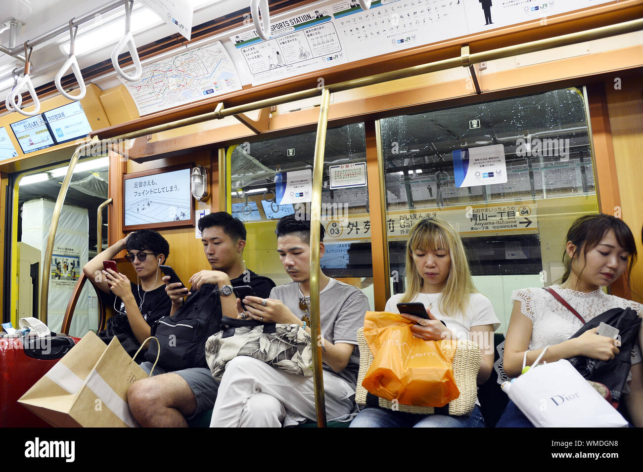 Smartphone users in Tokyo Subway Tokyo Street Scene Japan Stock