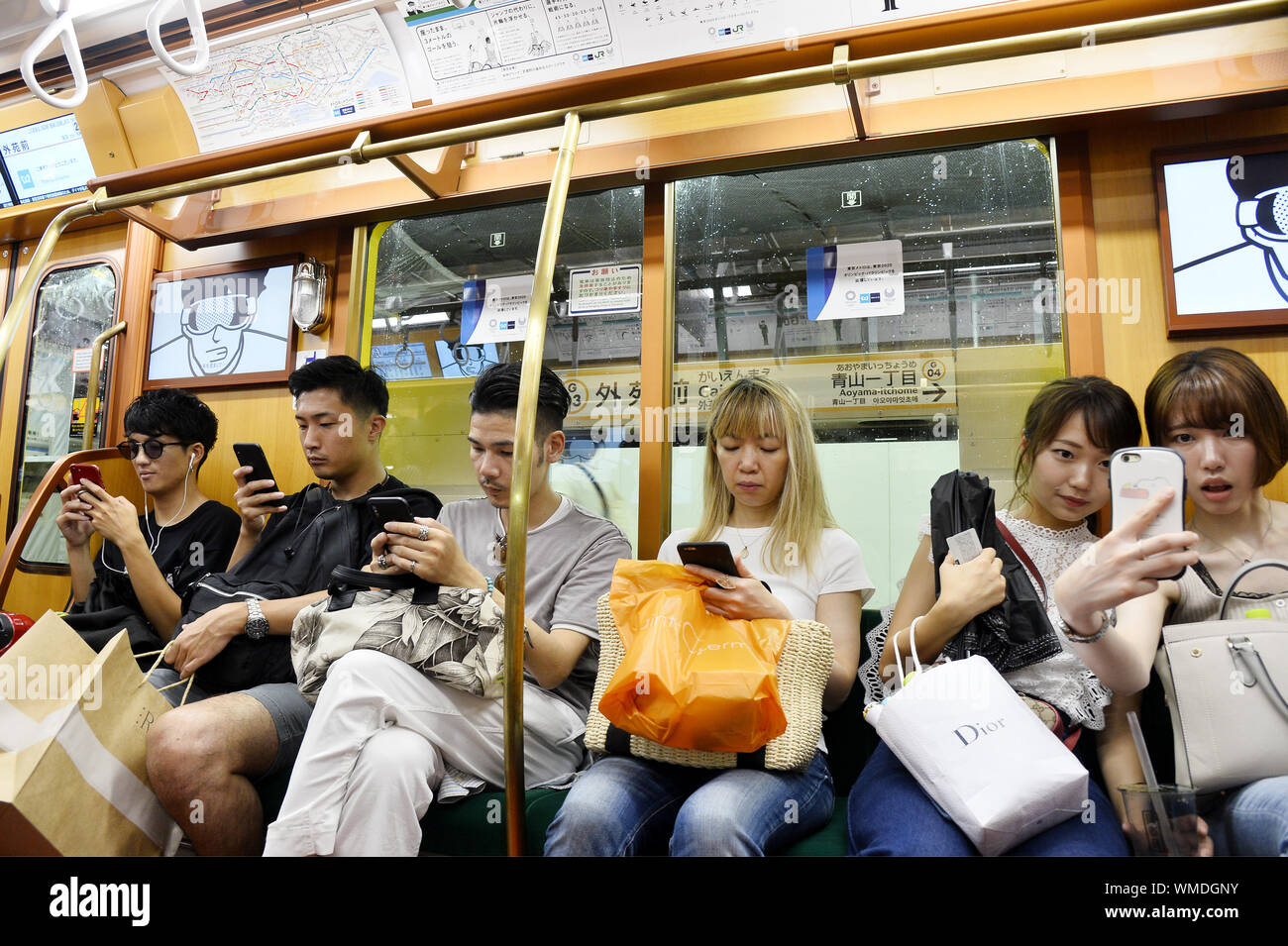 Smartphone users in Tokyo Subway Tokyo Street Scene Japan Stock