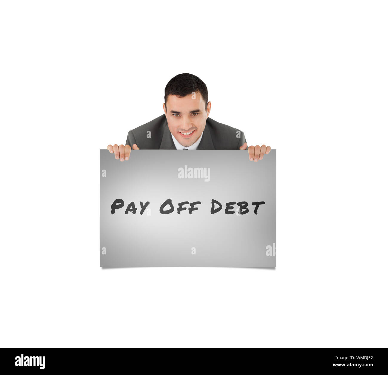 Businessman looking over wall against grey card Stock Photo - Alamy