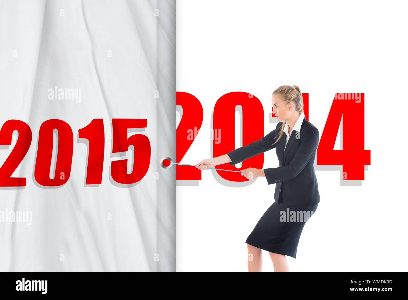 Focused blonde businesswoman pulling a rope against shadow Stock Photo ...