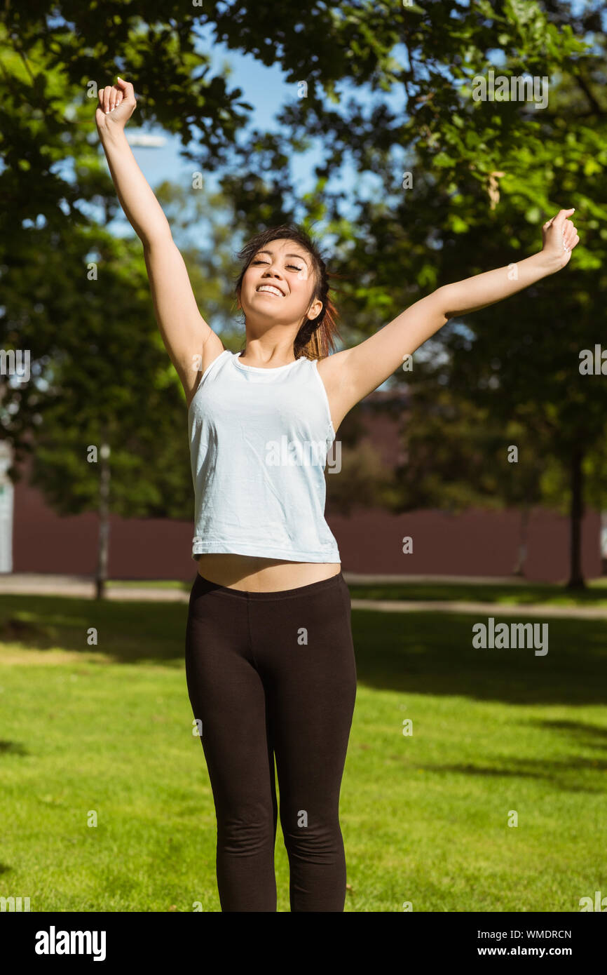 Woman runner stretching hands hi-res stock photography and images - Alamy