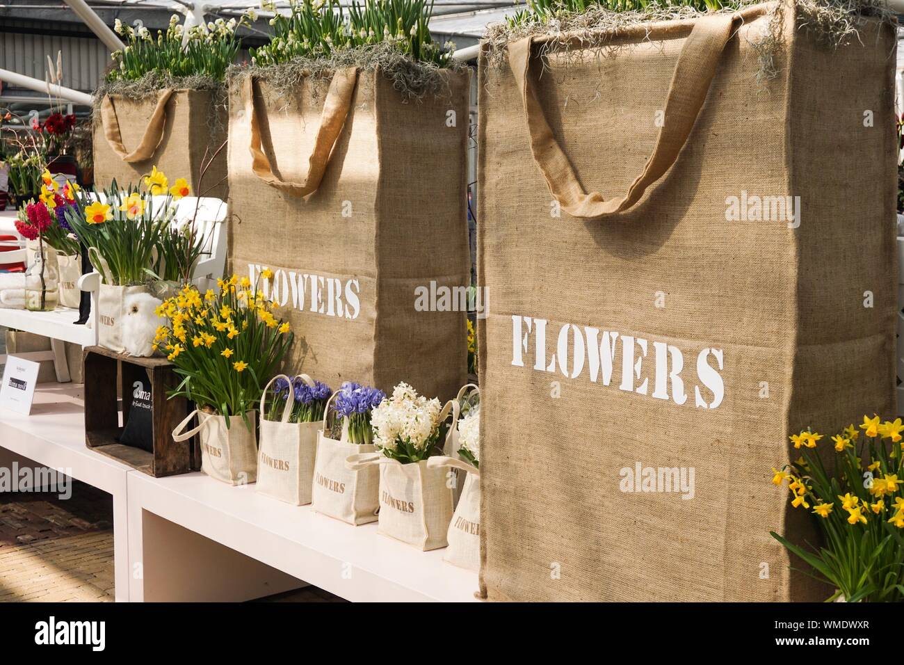Flowers In Jute Bags For Sale Stock Photo Alamy