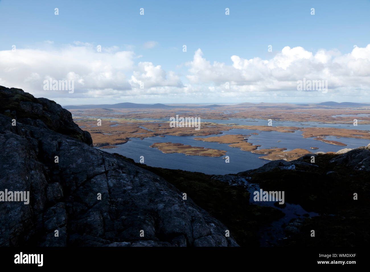 View from the slopes of Eaval over the lochan landscape of the Isle of North Uist, Outer Hebrides, Scotland. Stock Photo