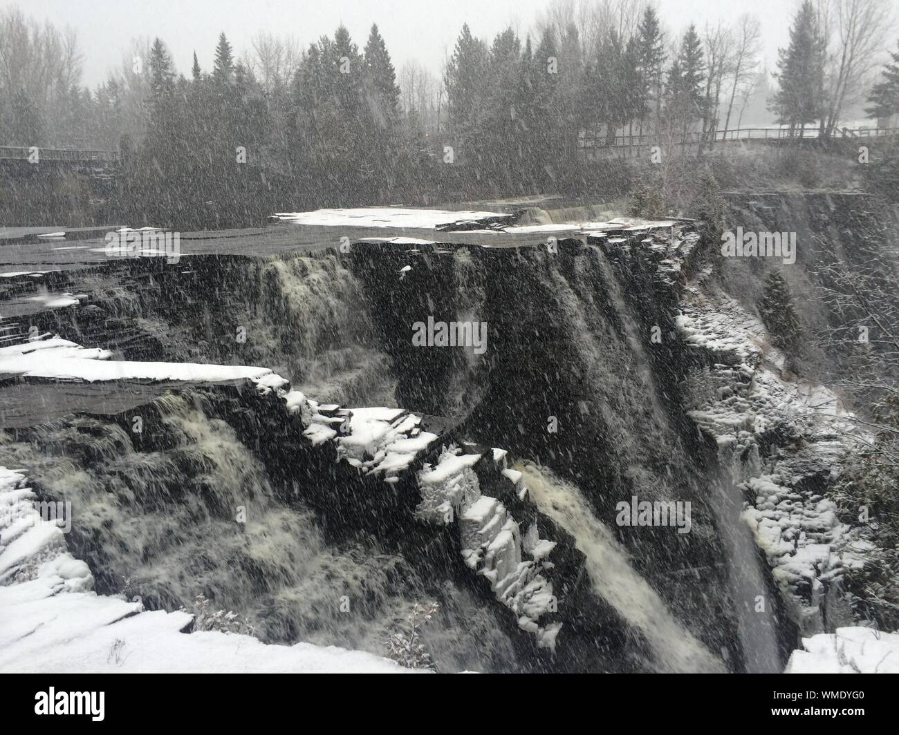 Scenic View Of Kakabeka Falls During Winter Stock Photo