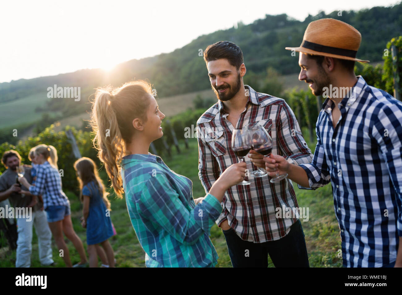 Picture of people tasting red wine in vineyard Stock Photo - Alamy