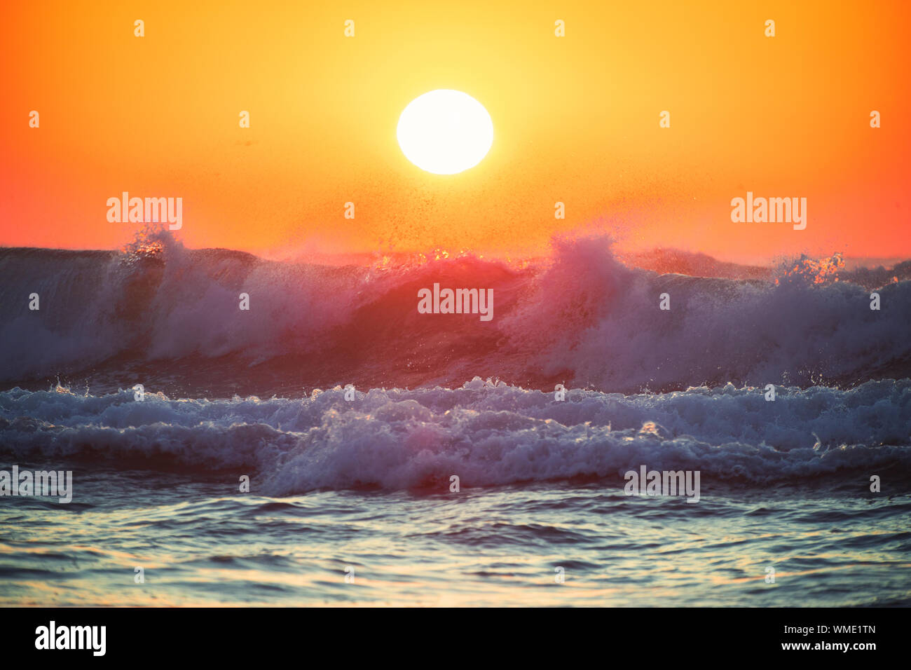 Beautiful blue sunrise wave Stock Photo