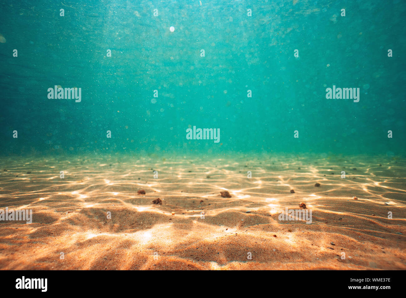 Sea sand and blue water. Underwater. ocean background. Stock Photo