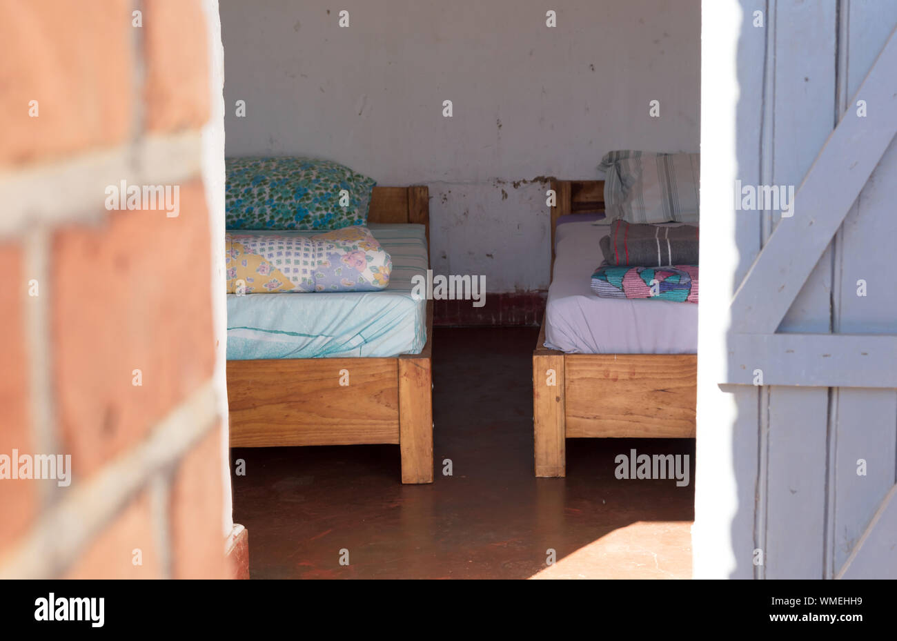 Old wooden bed (dormitory) in a non-touristic part of Madagascar Stock Photo