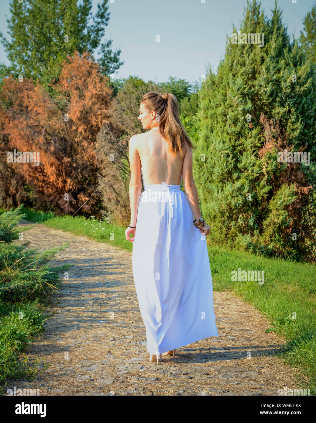 Back view of woman in high heels hi-res stock photography and images ...
