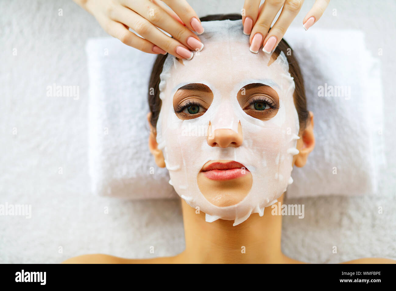 Spa treatments.Beautiful Woman In A Spa Salon. Relax and skin Cleansing ...