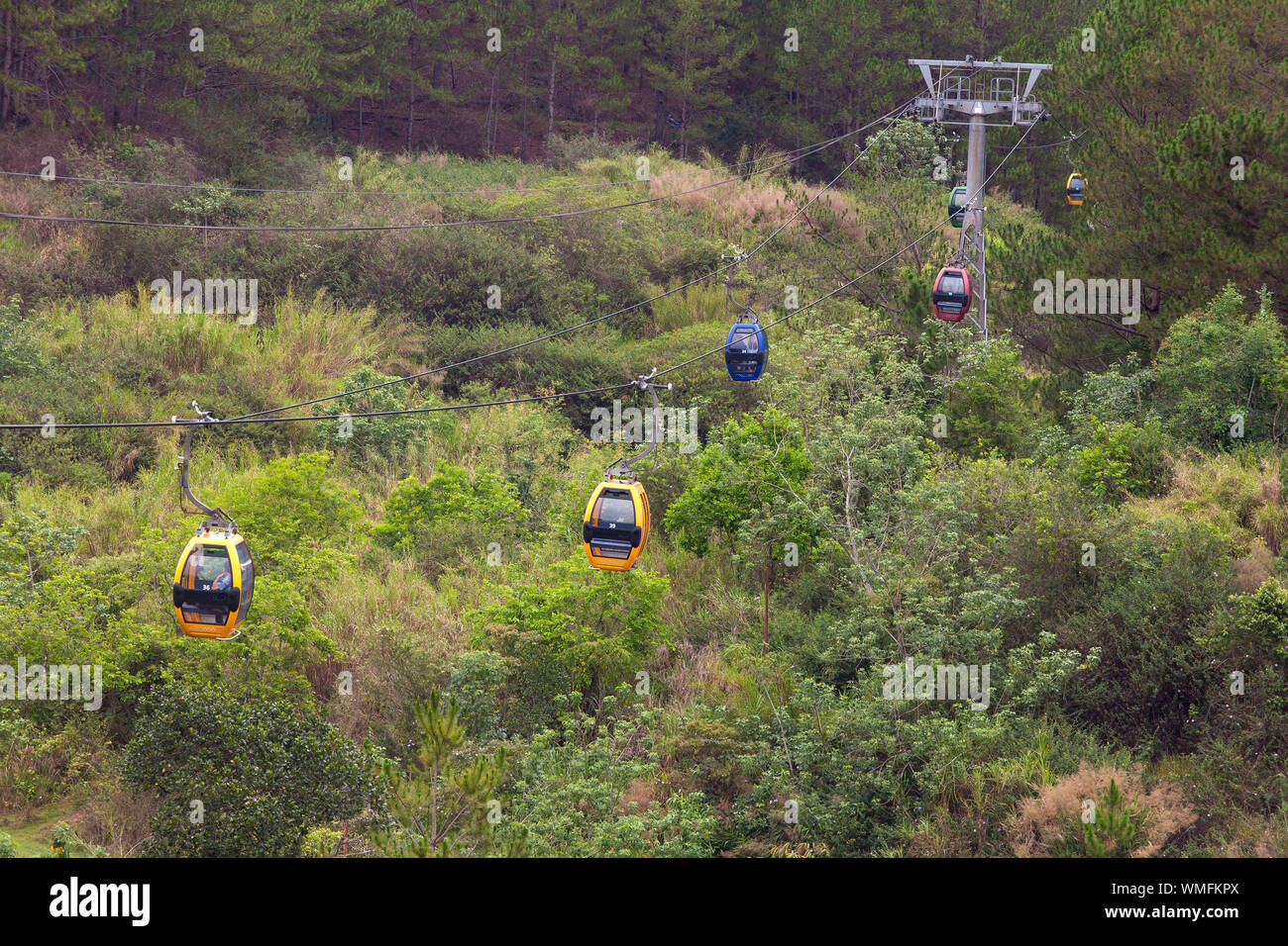 Cabin with tourists, cable car, Dalat, Vietnam Stock Photo