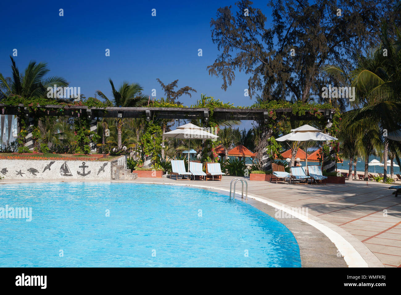 Swimming pool, Saigon Ninh Chu Resort on Phan Rang Beach, south china sea, Ninh Thuan, Vietnam Stock Photo