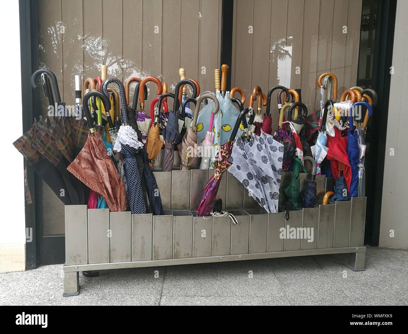Umbrellas stand hires stock photography and images Alamy