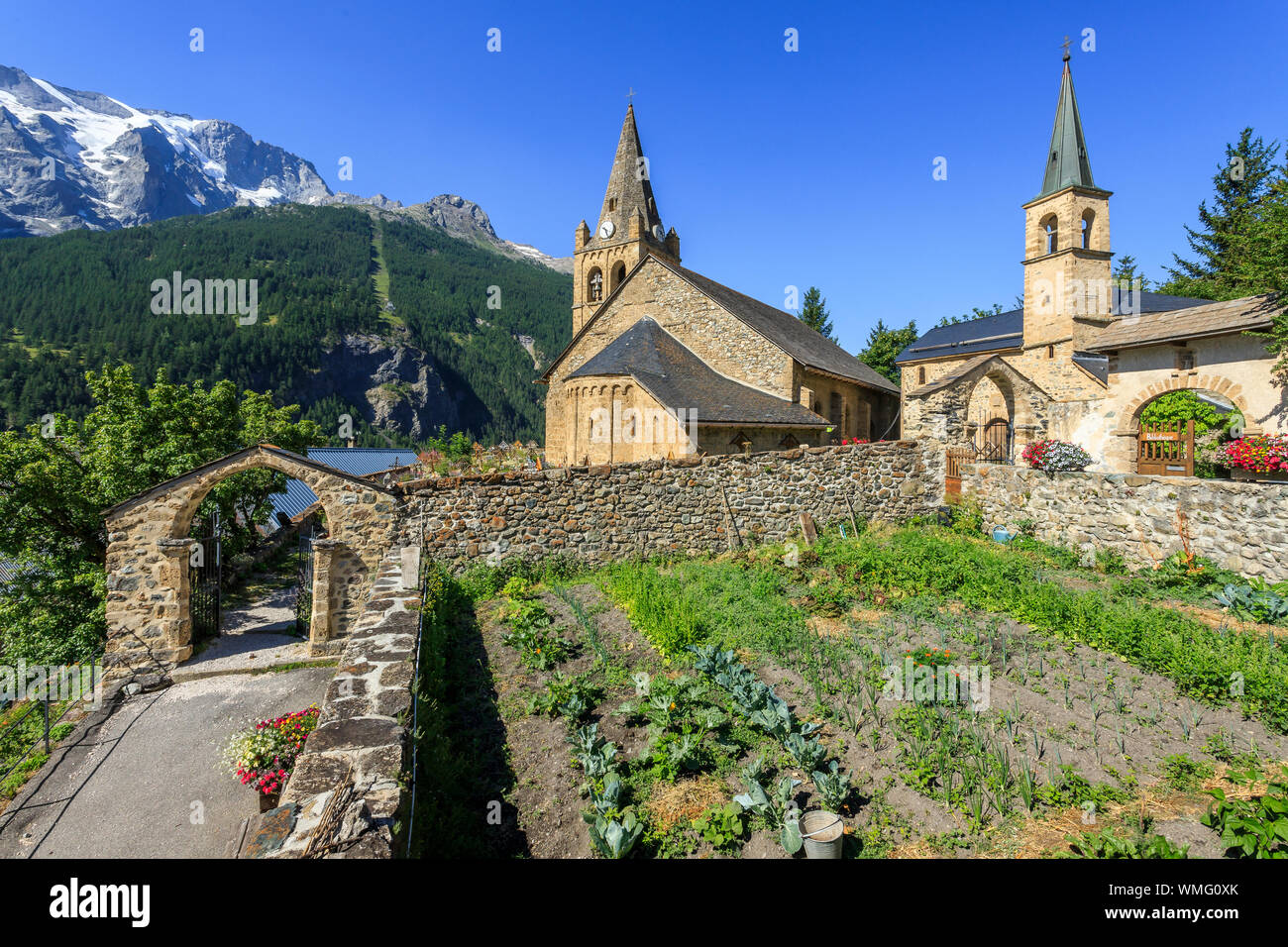 France, Hautes Alpes, Ecrins National Park, Oisans, La Grave, labelled the Most Beautiful Villages of France, Notre Dame de l’Assomption church and Pe Stock Photo