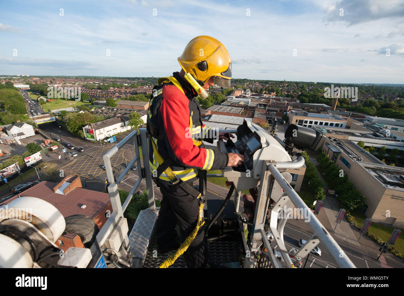 Firefighter on hydraulic platform Stock Photo Alamy