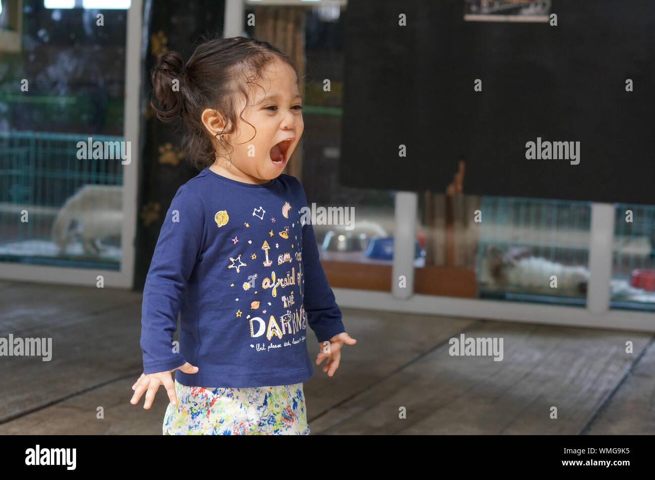 Baby Girl Yelling At Home Stock Photo