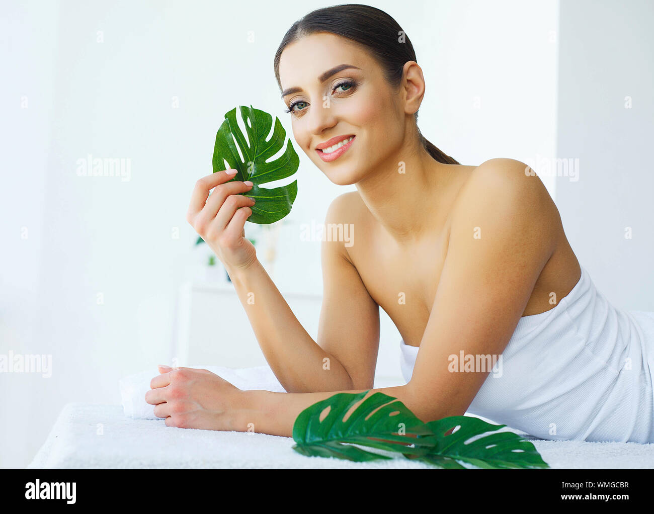 Beauty. A woman in the Beauty Salon. Lying on the Massage Tables Beauty. A woman in the Beauty Salon. Lying on the Massage Tables