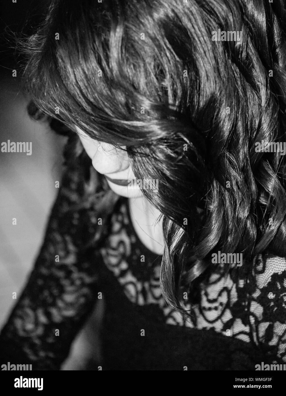 Close-up Of Woman Face Covered With Medium-length Hair Stock Photo