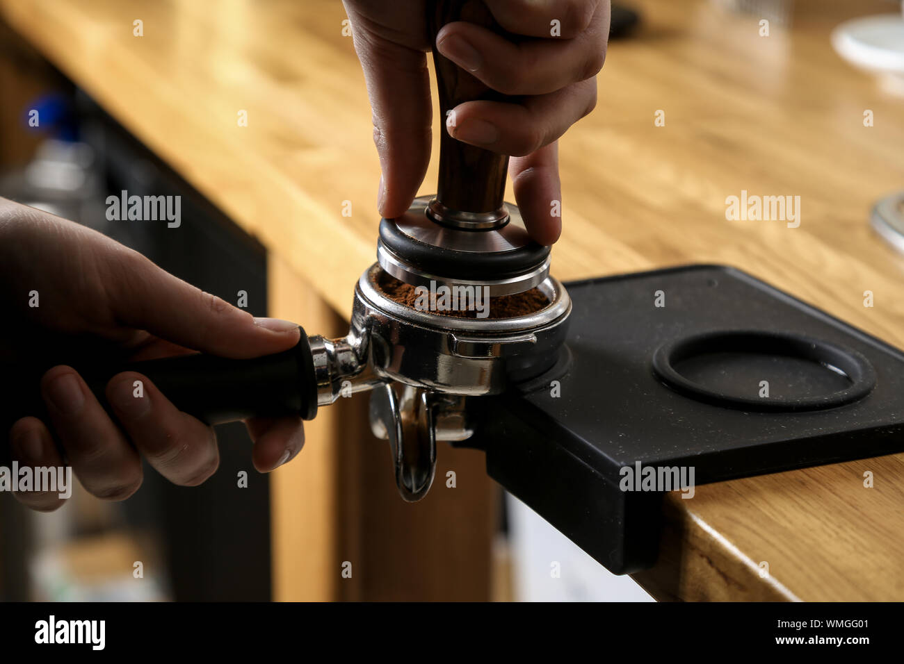 Crushing coffee beans hi-res stock 
