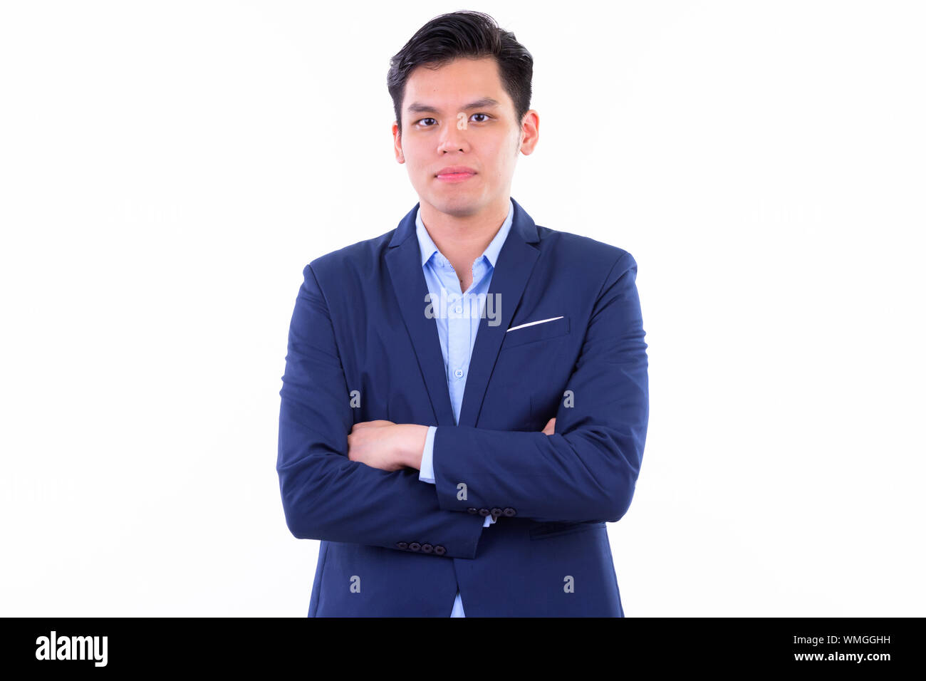 Young handsome Asian businessman with arms crossed Stock Photo - Alamy