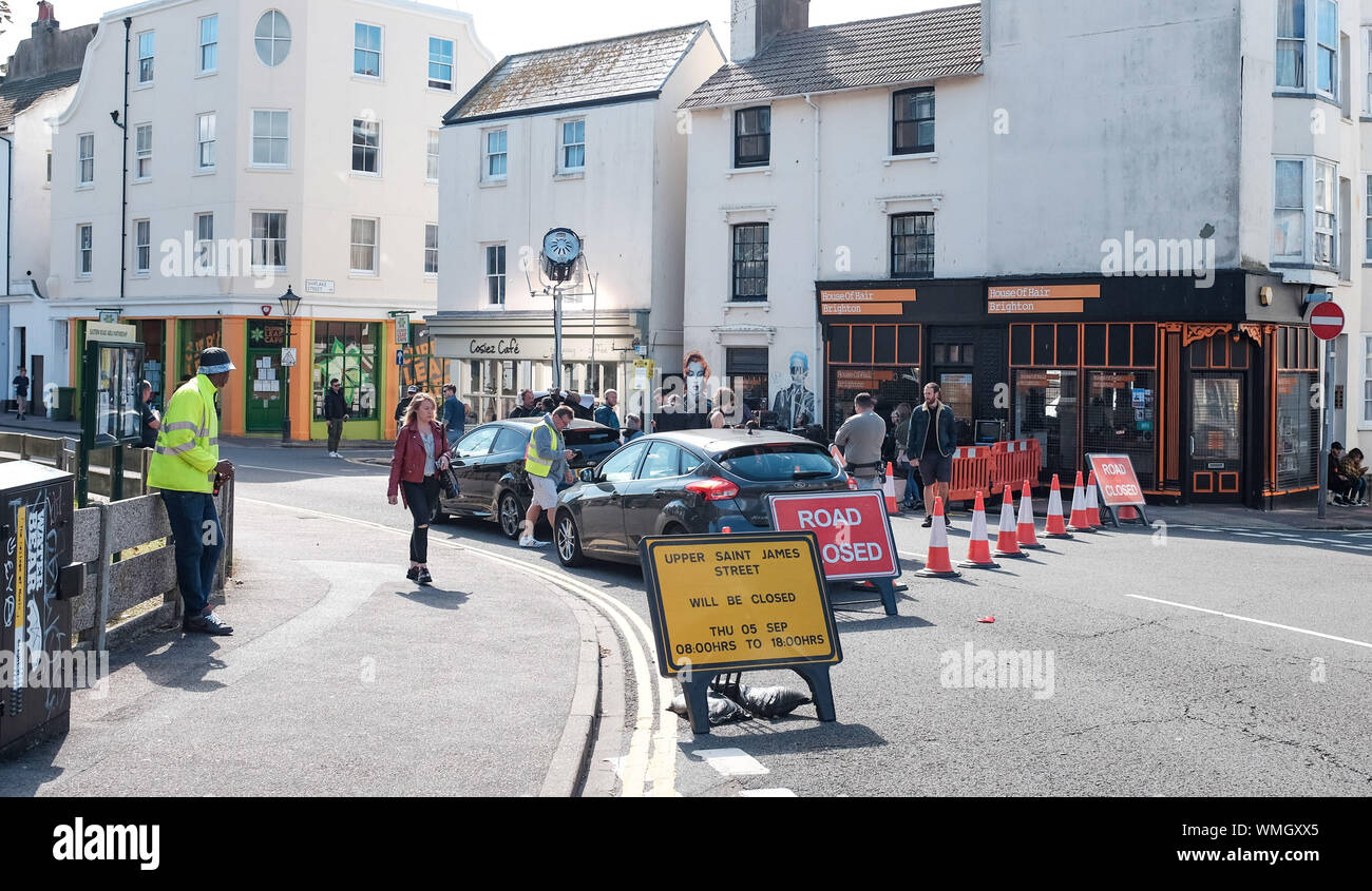 Brighton UK 5th September 2019 - A new Netflix show called Behind Her Eyes being filmed at Cosiez cafe in St James's Street Brighton today. The psychological thriller is an adaptation of a best selling novel of the same name and is being produced by Steve Lightfoot . Credit: Simon Dack / Alamy Live News Stock Photo