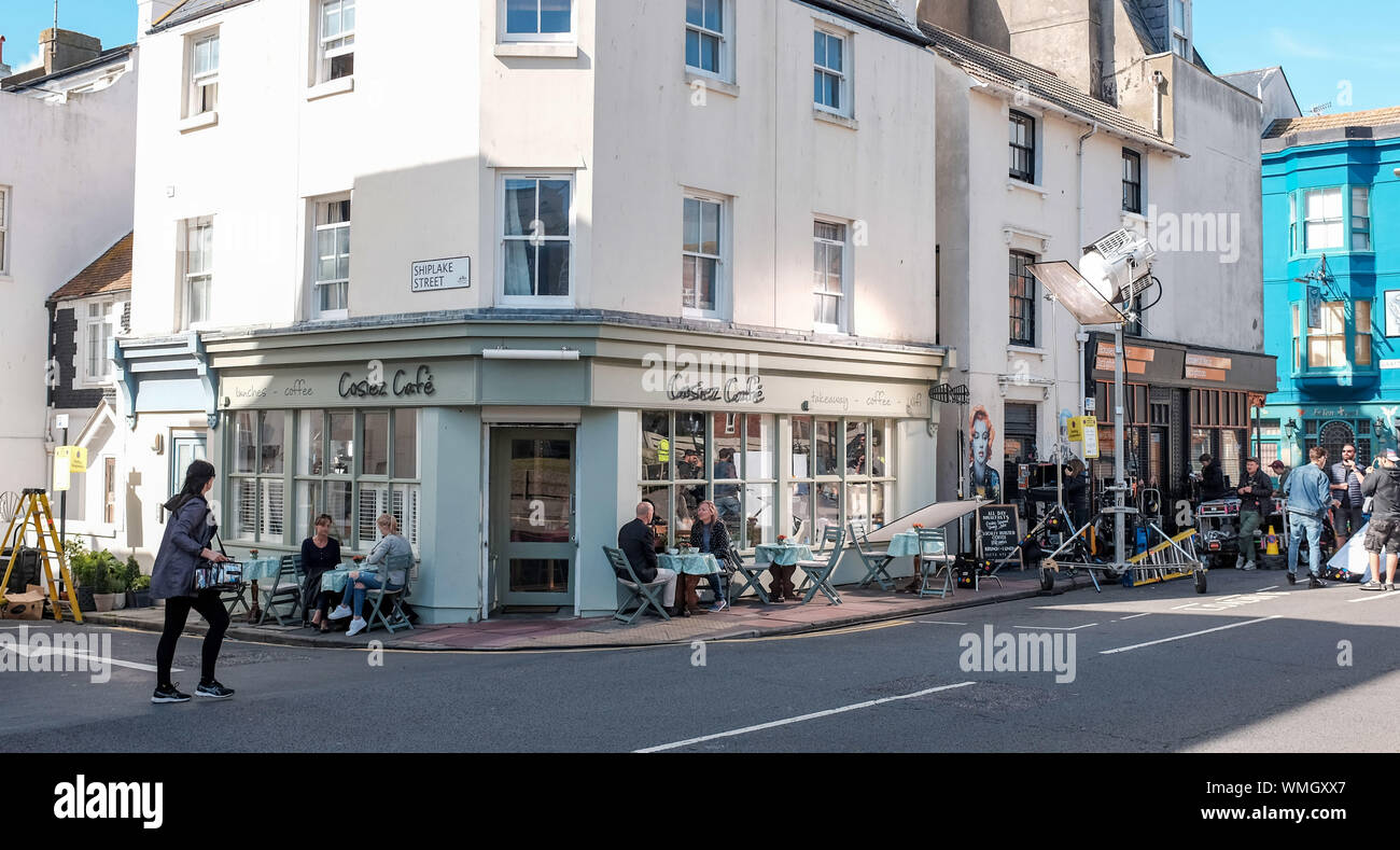 Brighton UK 5th September 2019 - A new Netflix show called Behind Her Eyes being filmed at Cosiez cafe in St James's Street Brighton today. The psychological thriller is an adaptation of a best selling novel of the same name and is being produced by Steve Lightfoot . Credit: Simon Dack / Alamy Live News Stock Photo