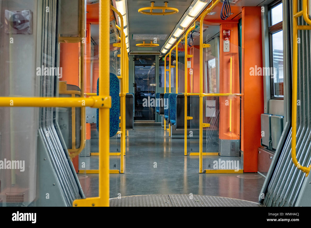 View into the passenger compartment of a subway with a view of the driver's cab Stock Photo