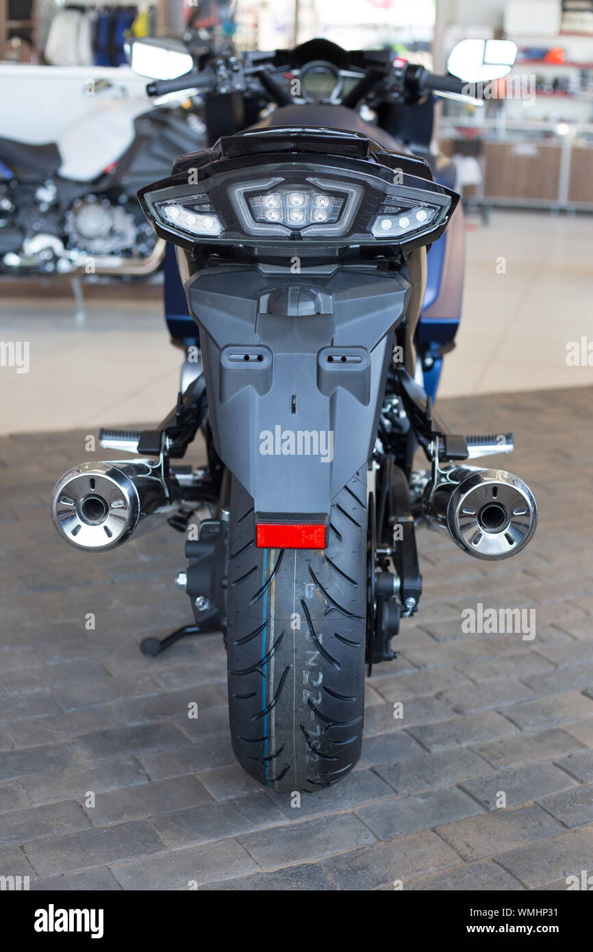 Russia, Izhevsk - August 23, 2019: Yamaha motorcycle shop. New modern motorbike FJR1300 in motorcycle store. Back view. Famous world brand. Stock Photo