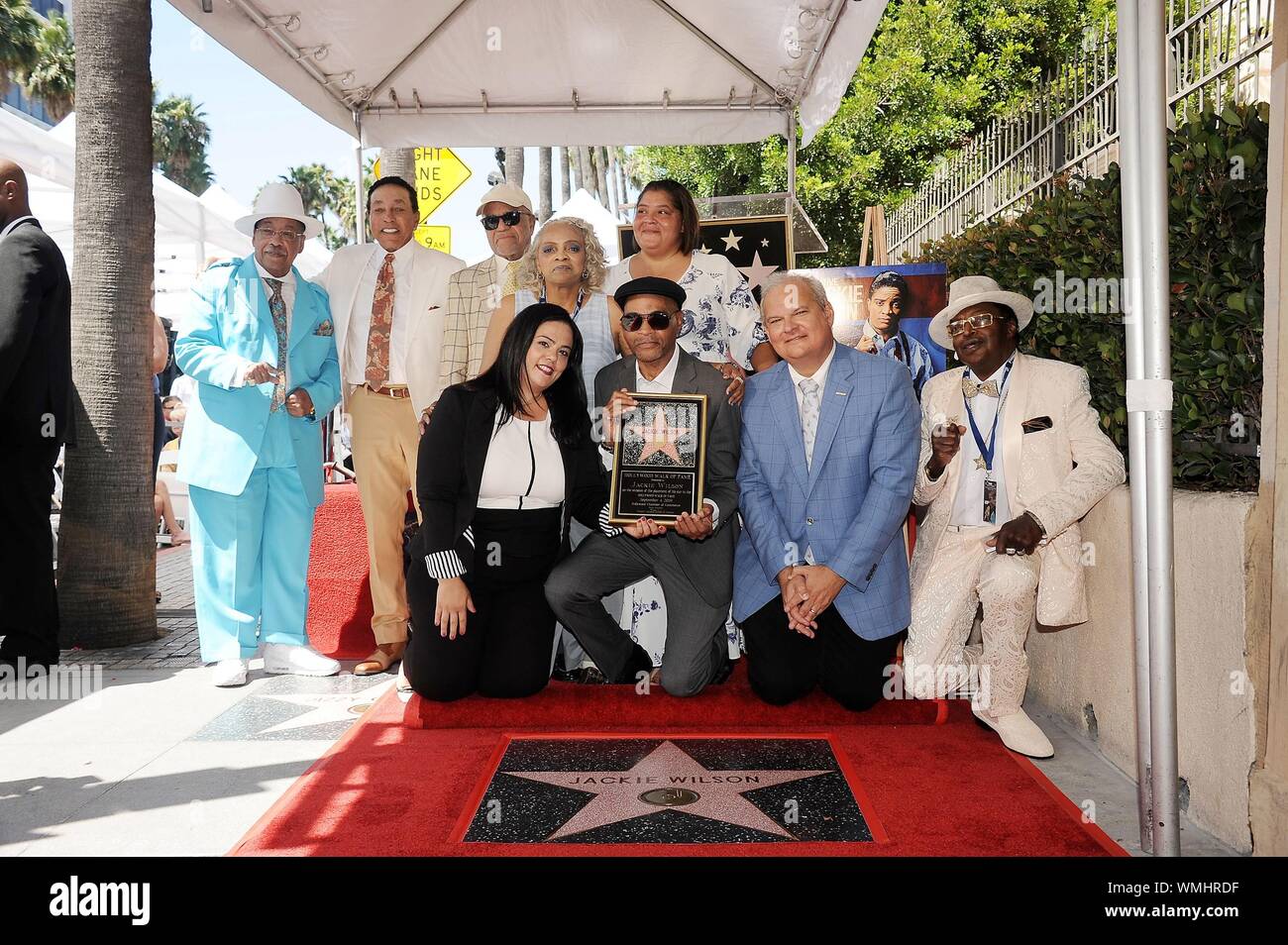 Los Angeles, CA. 4th Sep, 2019. Marshall Thompson, Smokey Robinson, Berry Gordy Jr., Rana Ghadban, Jackie Wilson family, Jeff Zarrinnam at the induction ceremony for Posthumous Star on the Hollywood Walk of Fame for Jackie Wilson, Hollywood Boulevard, Los Angeles, CA September 4, 2019. Credit: Michael Germana/Everett Collection/Alamy Live News Stock Photo