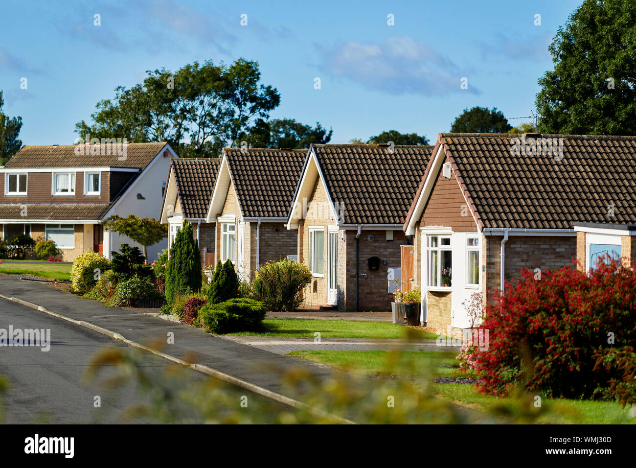 Row of Bungalow houses in a street Stock Photo