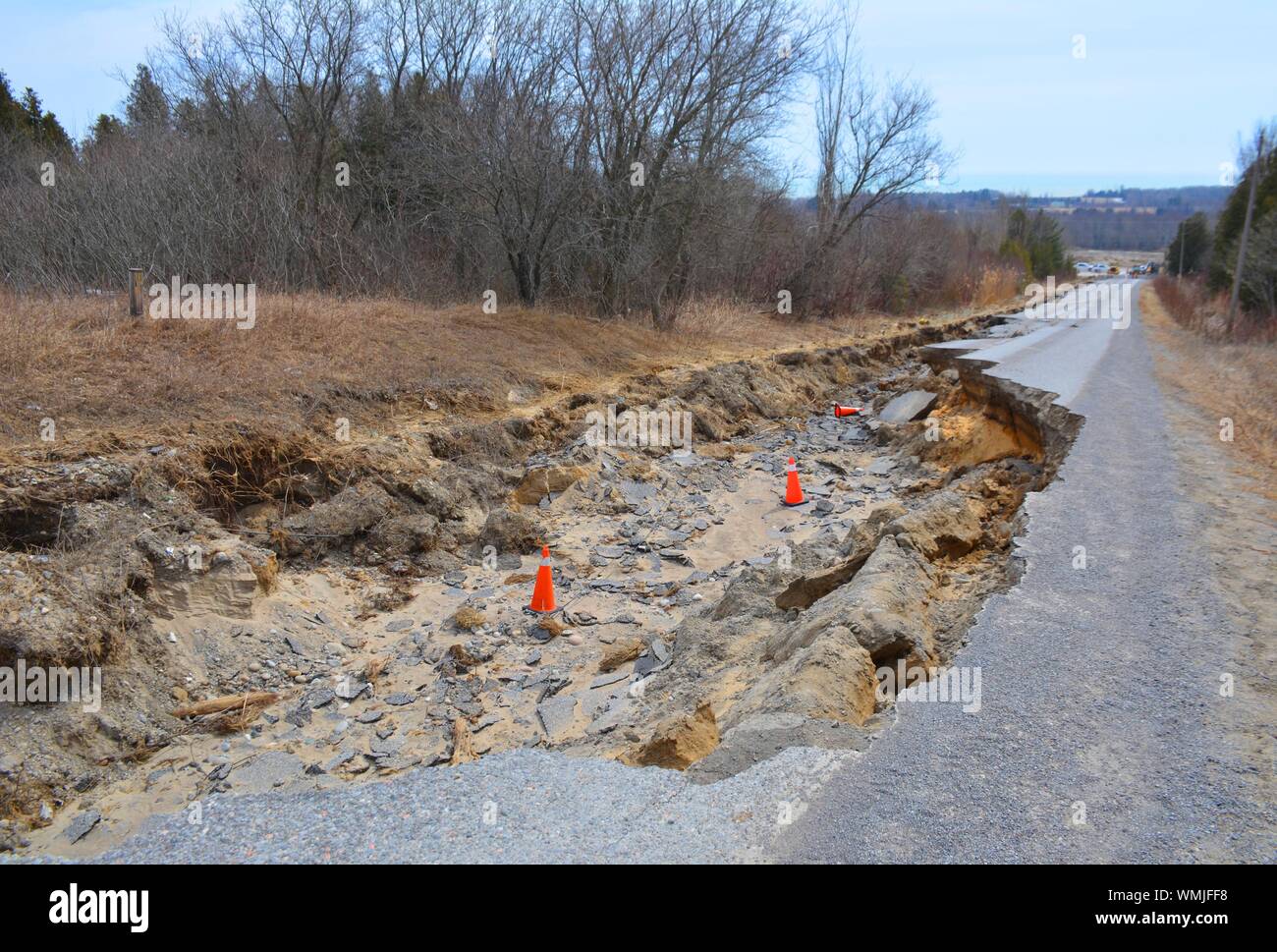 Road destroyed by erosion due to spring thaw and run off Stock Photo