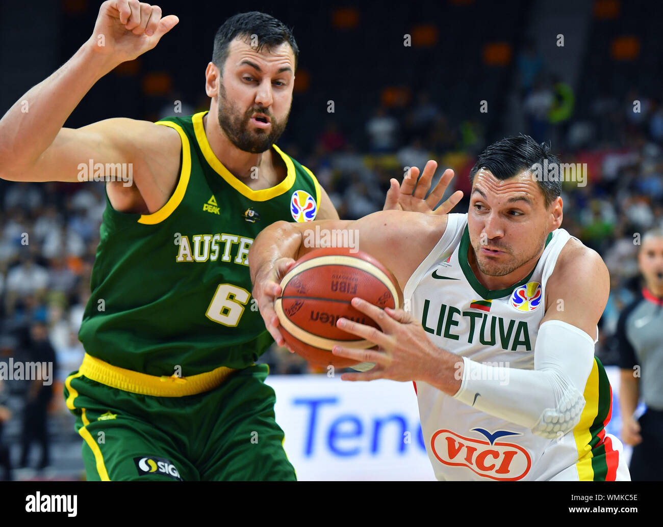 Dongguan, China's Guangdong province. 5th Sep, 2019. Jonas Maciulis (R) of Lithuania breaks through against Andrew Bogut of Australia during the group H match between Lithuania and Australia at the 2019 FIBA World Cup in Dongguan, south China's Guangdong province, Sept. 5, 2019. Credit: Zhu Zheng/Xinhua/Alamy Live News Stock Photo
