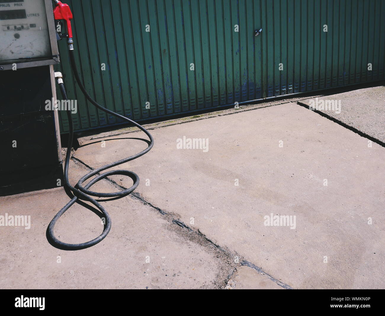 Pump By Gate At Fuel Station Stock Photo