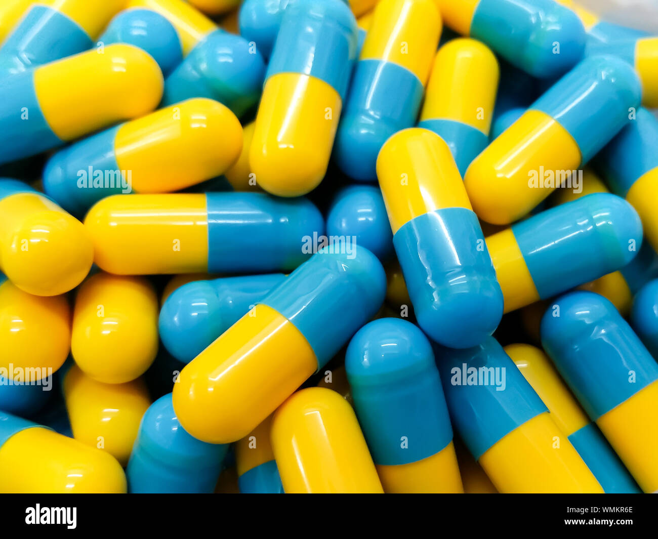 Download Full Frame Shot Of Blue And Yellow Capsules Stock Photo Alamy Yellowimages Mockups