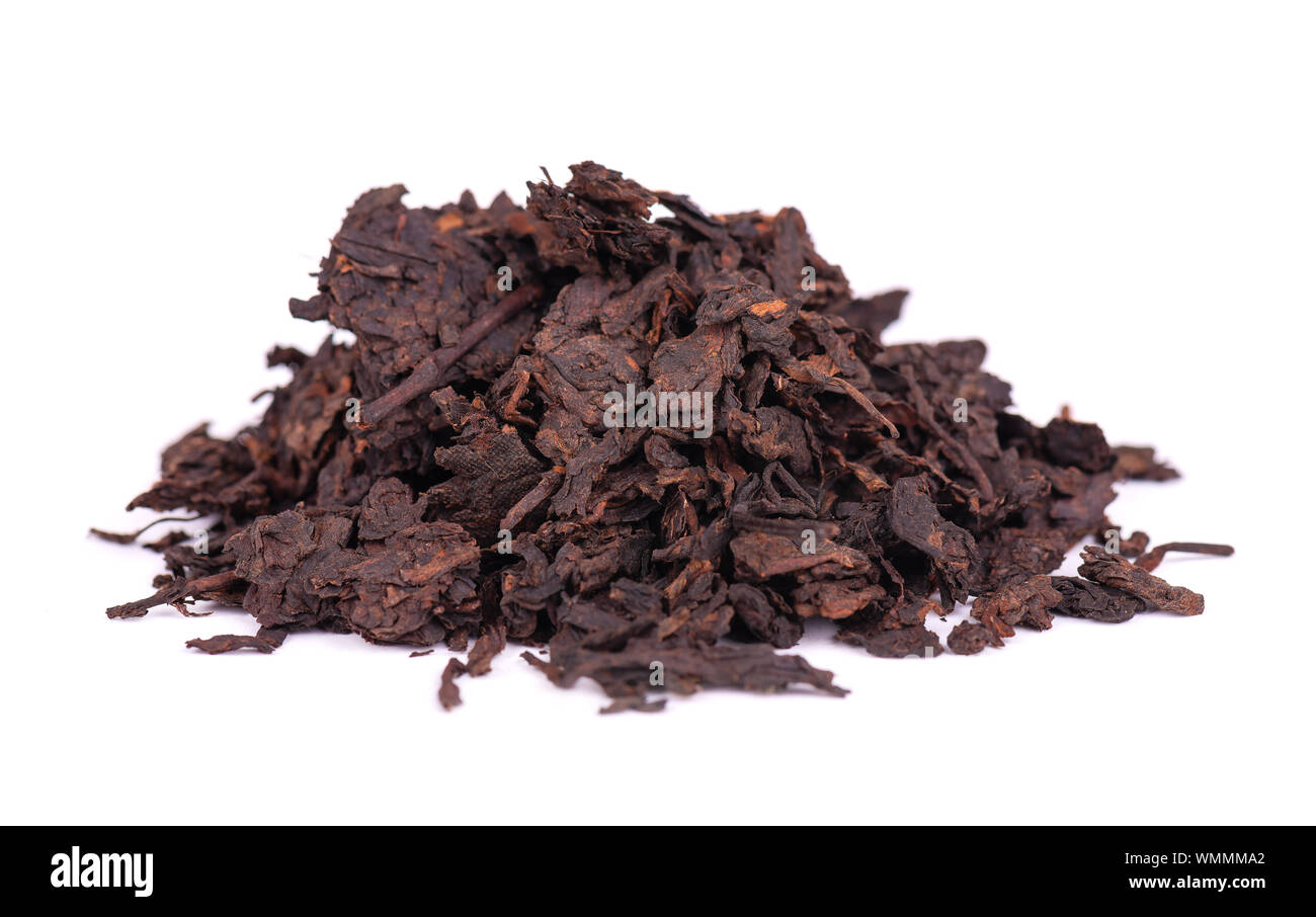 Chinese tea Shou Puer. Pressed fermented Puerh tea. Macro close up