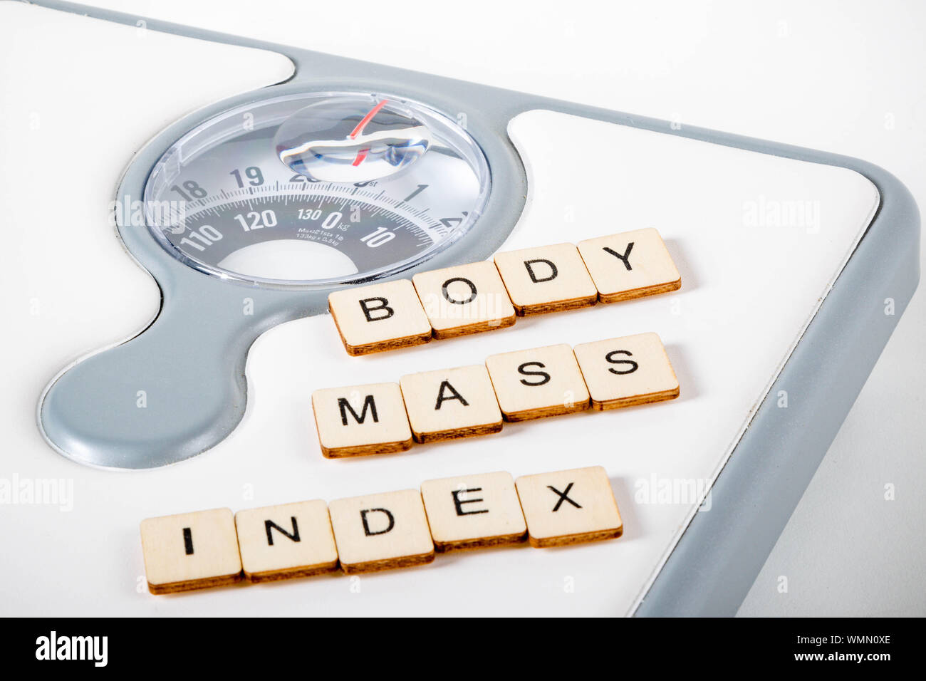 Healthcare concept showing bathroom scales and the message body mass
