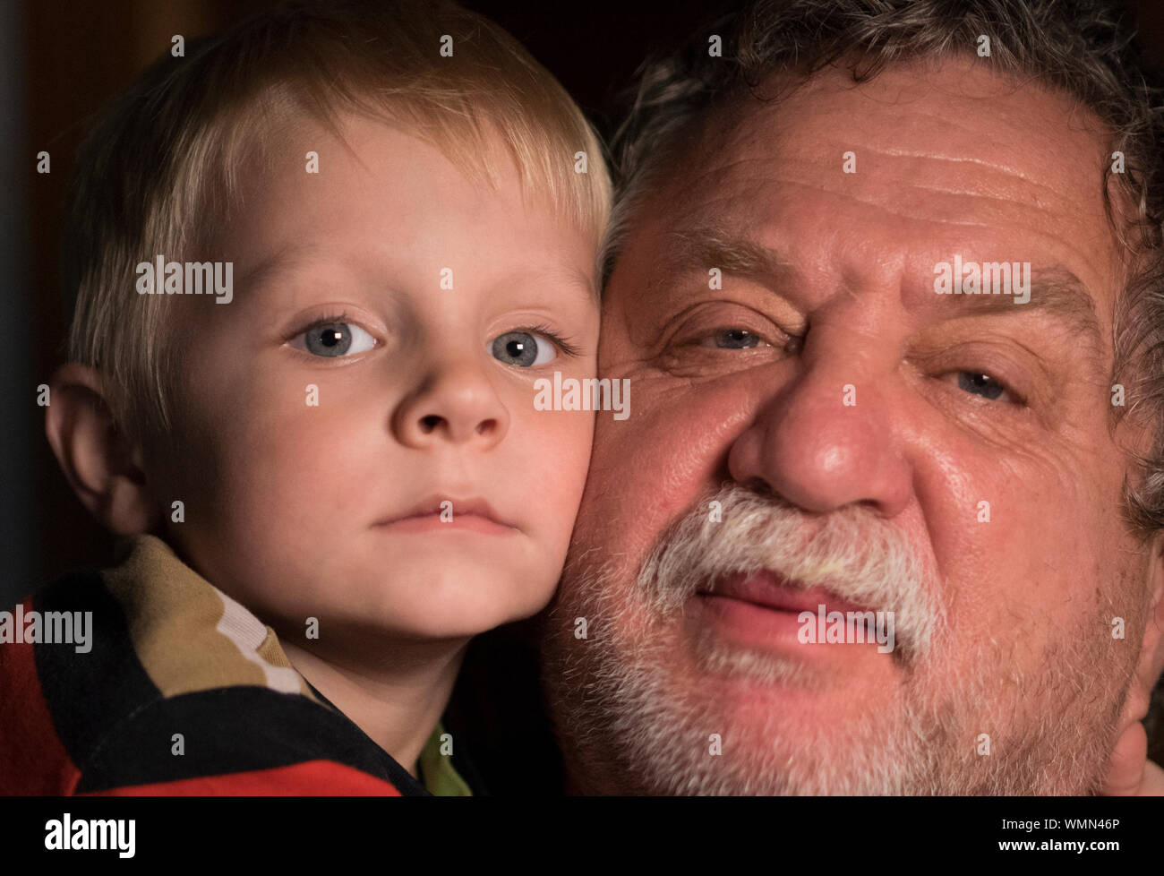 Close-up Portrait Of Grandfather And Grandson Stock Photo